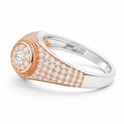 A rose gold and white gold ring featuring a pavé diamond band and a round diamond center stone, shown on a clean white background.