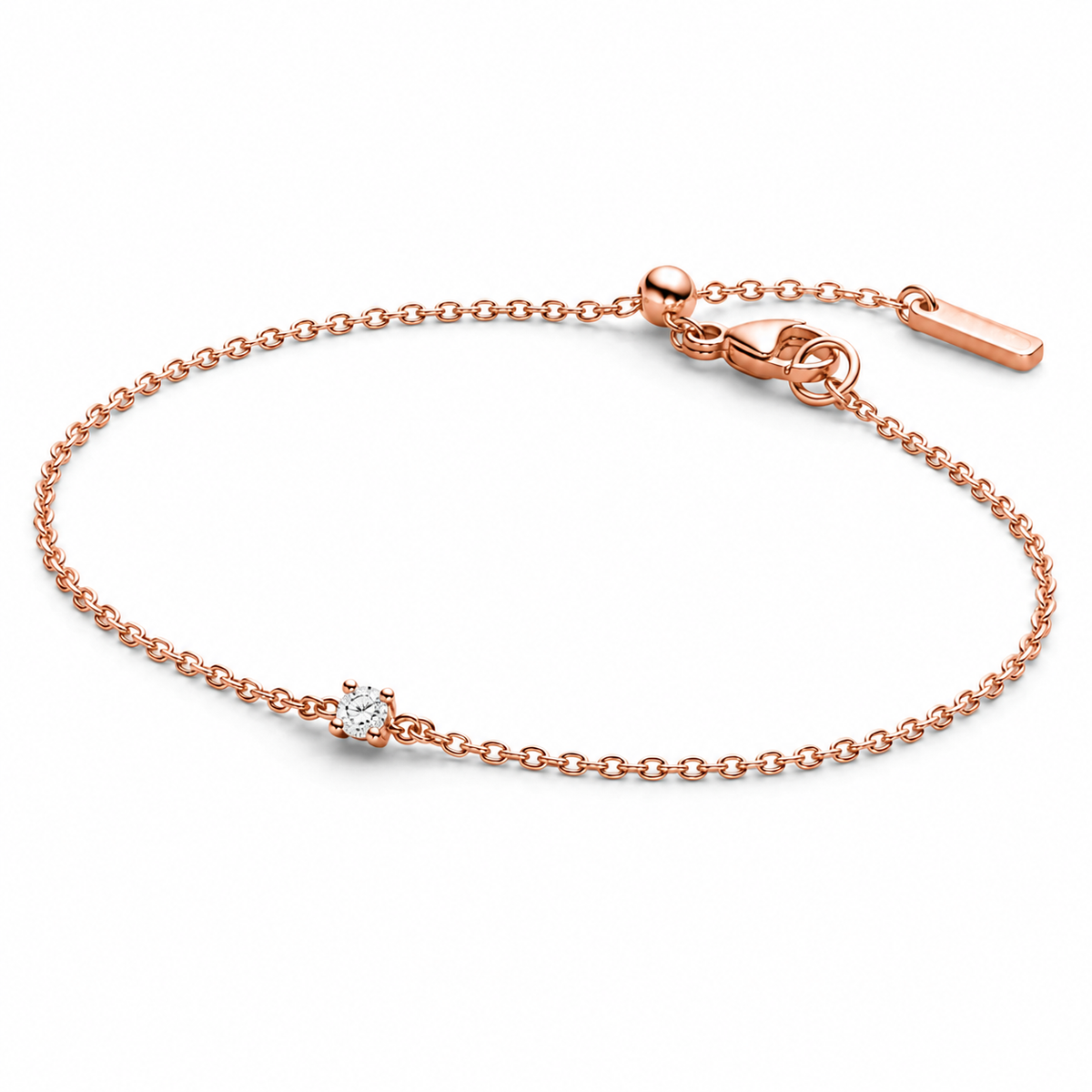 A delicate rose gold chain bracelet with a single bezel-set clear gemstone and an adjustable lobster clasp, shown on a clean white background.