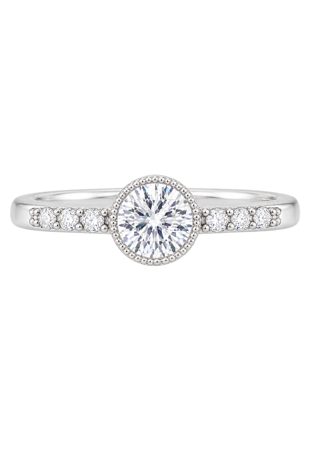 A silver-tone diamond engagement ring with a round-cut center stone in a halo setting, flanked by small side stones on a plain white background.