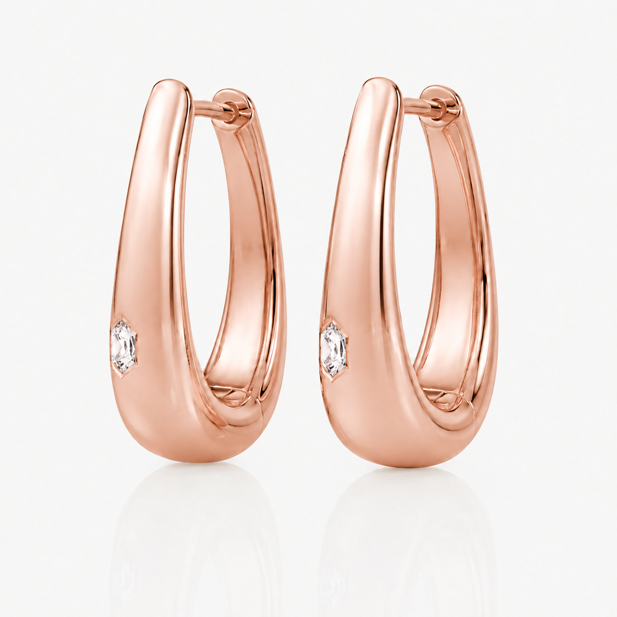 Yellow gold teardrop hoop earrings with bezel-set round diamonds