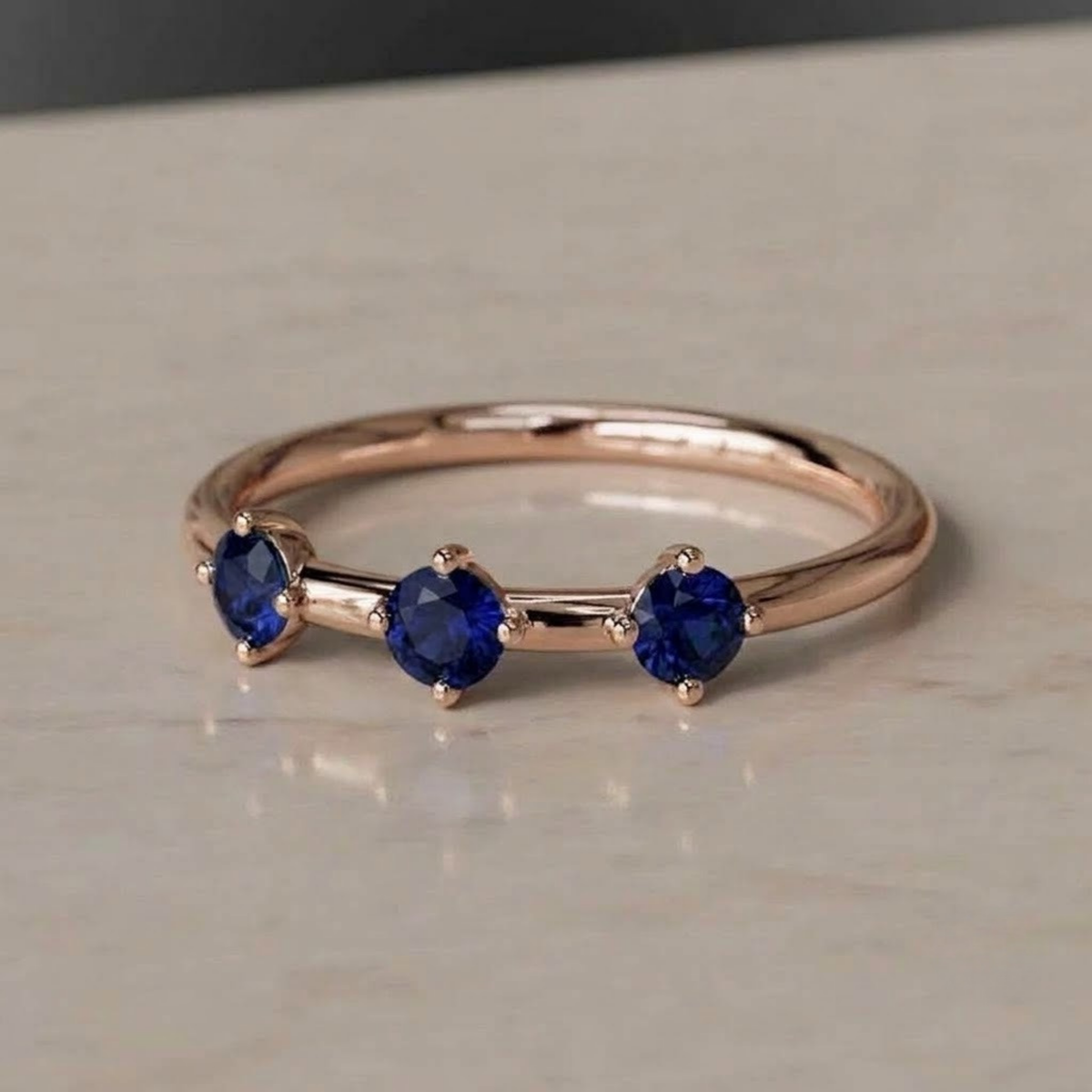Three-Stone Blue Sapphire Ring in Solid Gold