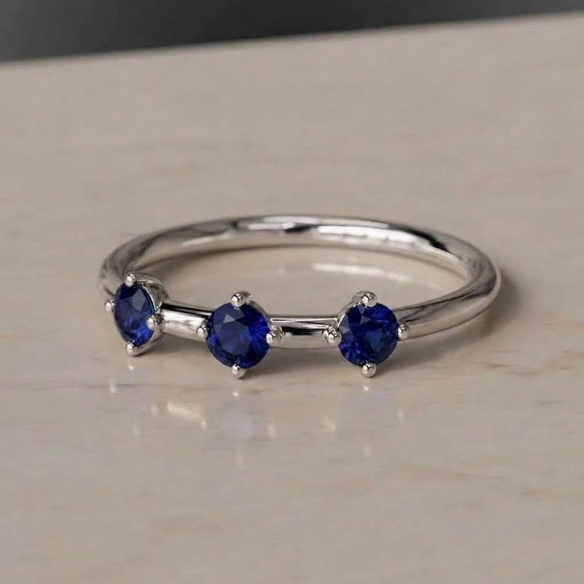 Three-Stone Blue Sapphire Ring in Solid Gold