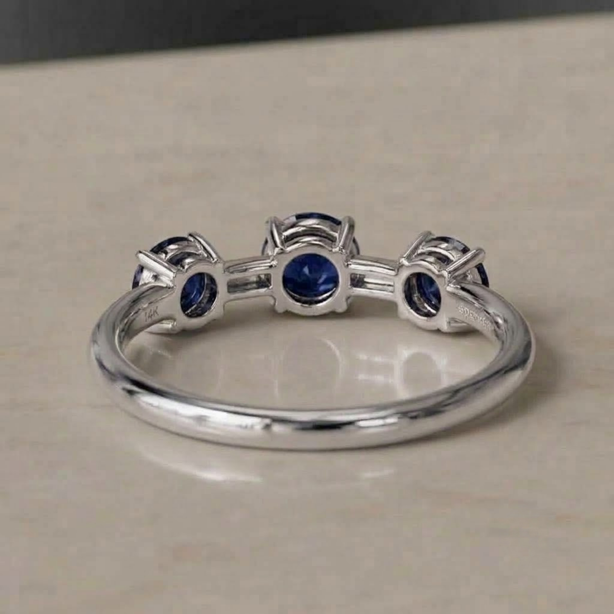 Three-Stone Blue Sapphire Ring in Solid Gold