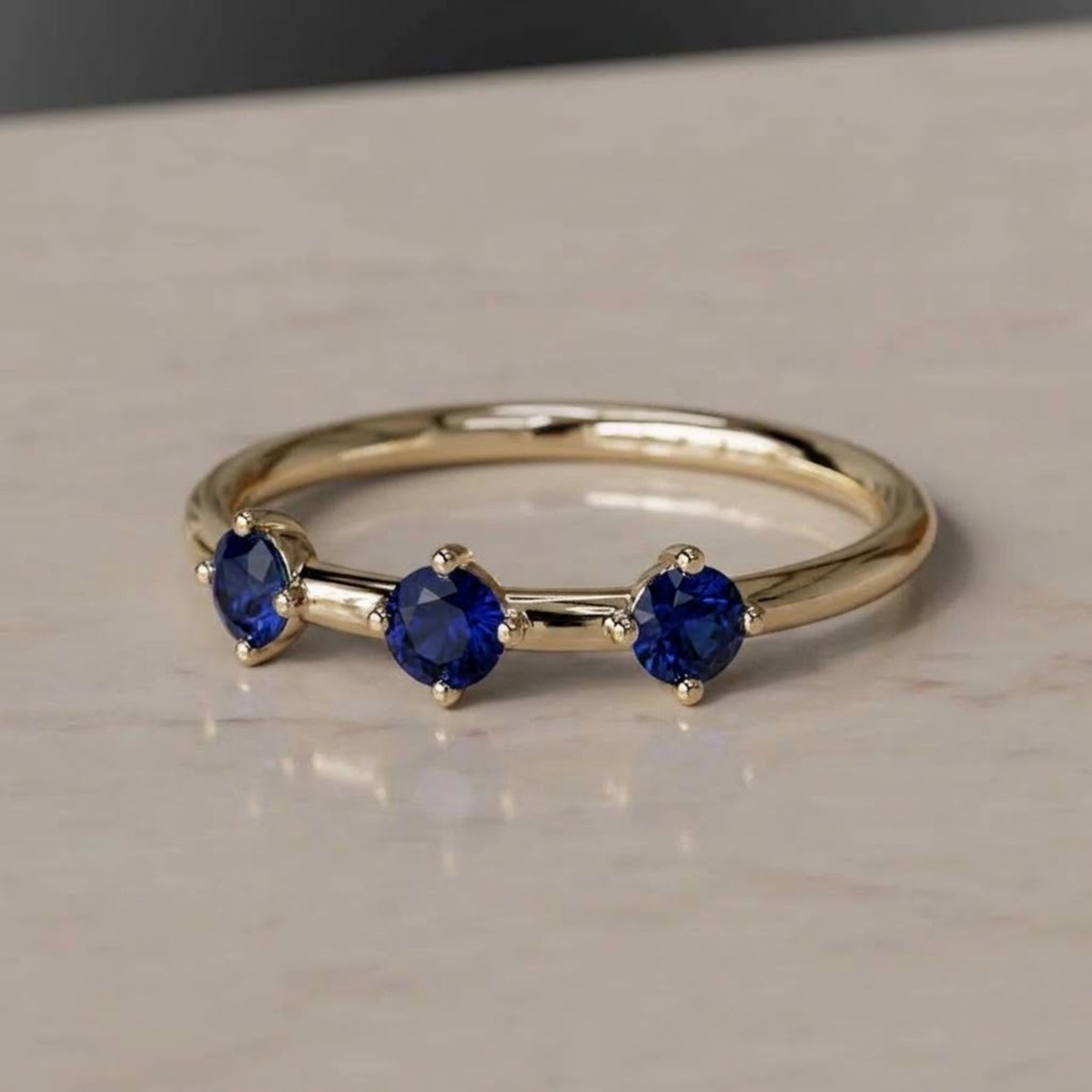 Three-Stone Blue Sapphire Ring in Solid Gold