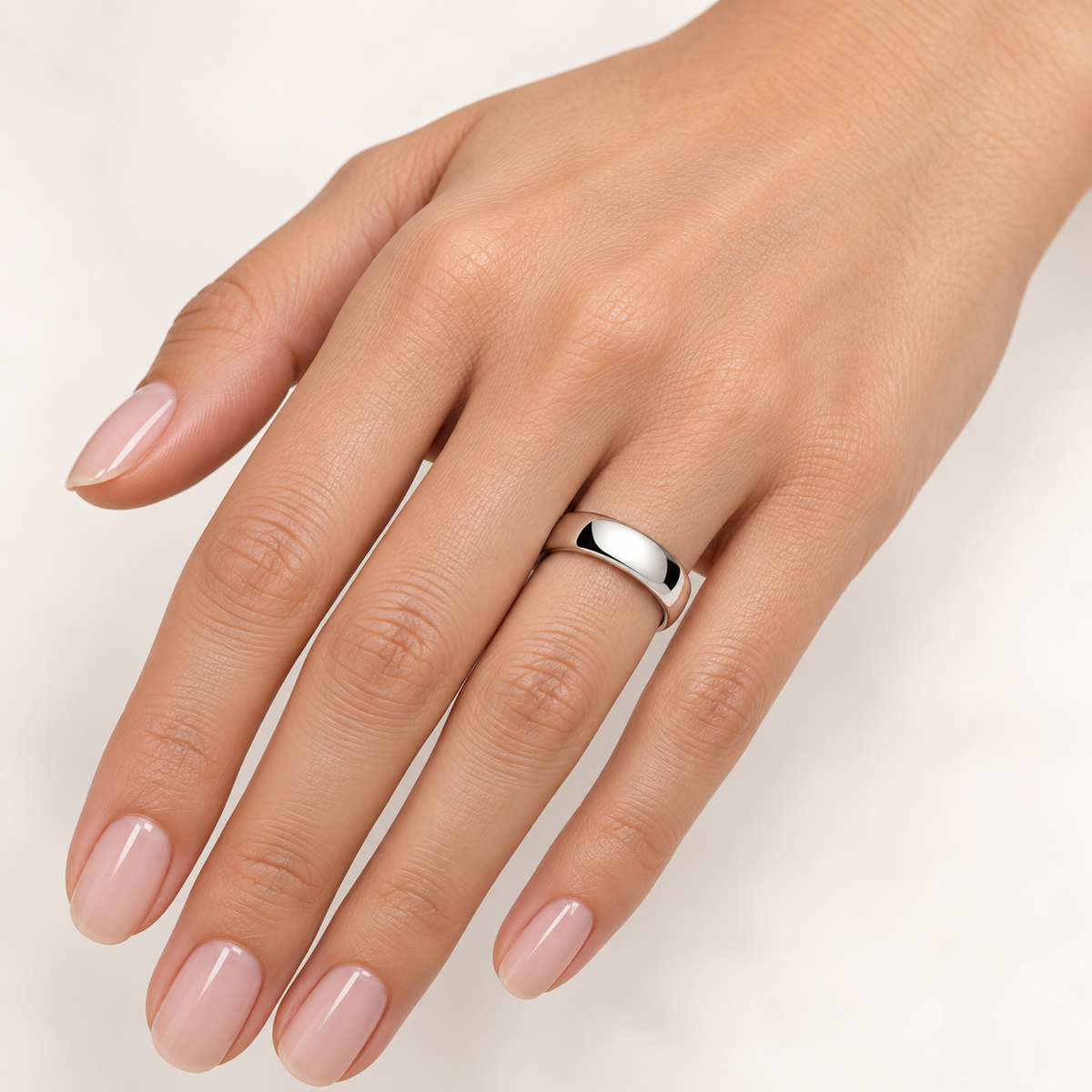 6mm sterling silver unisex wedding band worn on finger