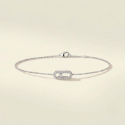 Front view of delicate solid gold lab grown diamond bracelet with pavé-set motif